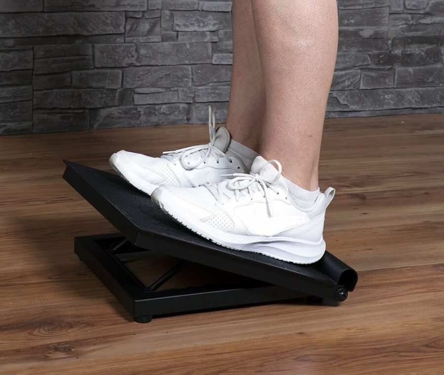model standing on slant board