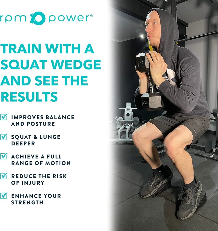 Man squatting with hex dumbbell in hand