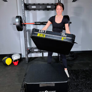 Woman Holding on Jump Box