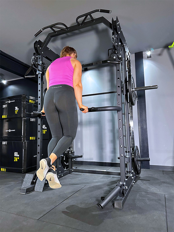 Woman doing tricep dip on Power Rack Home Gym