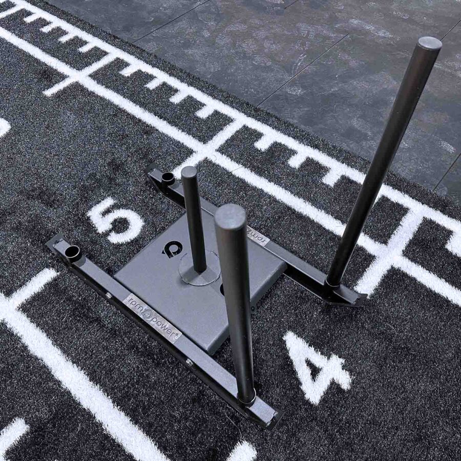 Prowler Dog Sled on Astro Grass in a gym setting