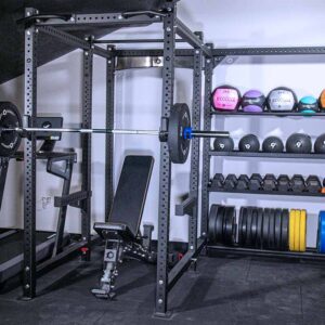 Power Rack with Storage, including a weight bench, dumbbells, kettlebell, weight plates, olympic barbell and wall balls, slam balls and medicine balls