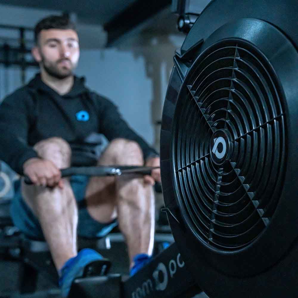 Man on Air Rowing Machine