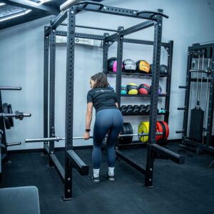 Woman Using Squat RACK