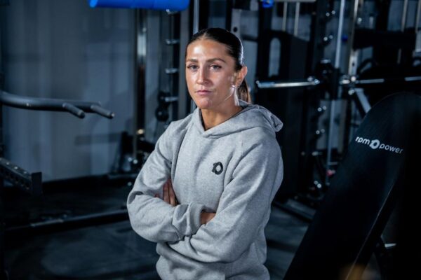 Amy Leigh Murphy Crowe with her arms folded