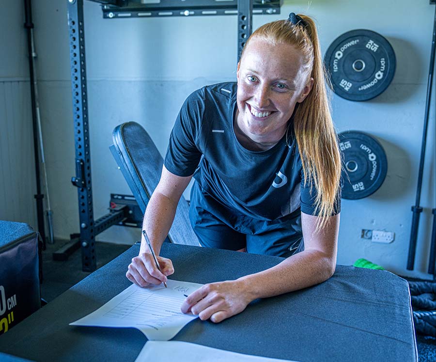 Aishling Moloney signing a contract with RPM Power