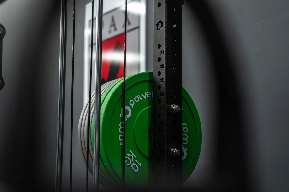 Close up of a RPM Power weight plate in green