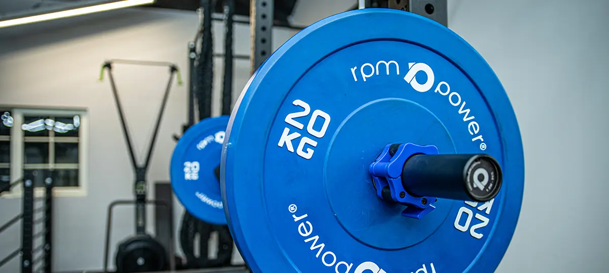 A weight plate sitting on weight plate storage