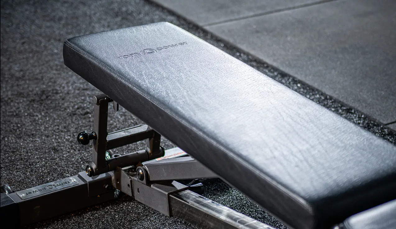 A weight bench in a gym